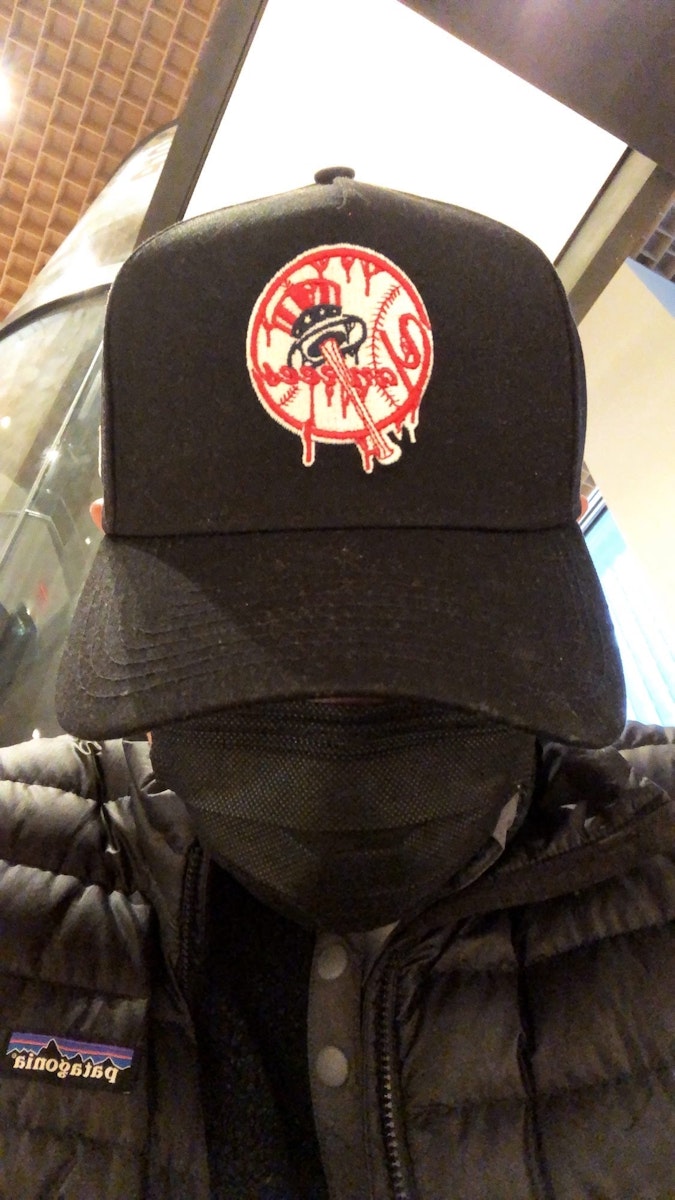 Peter representing NY in his Yankee's hat